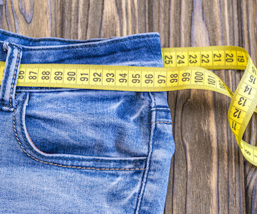 Jeans with measuring tape