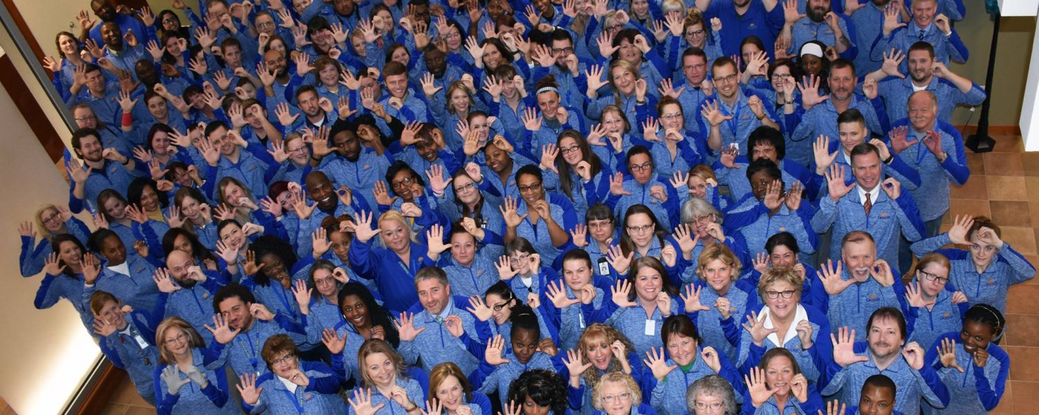 Aerial photo of Damar staff celebrating 50th anniversary