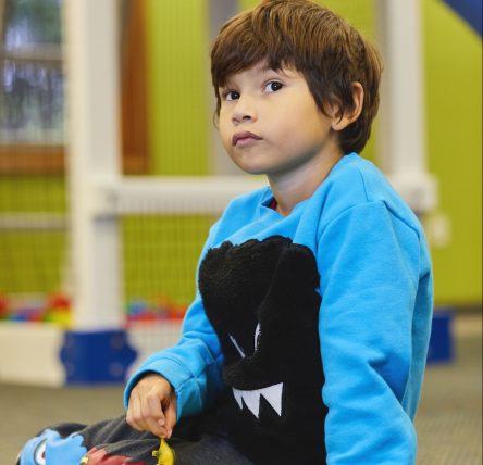 male child playing with toys