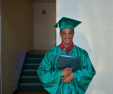 Marcus in graduation gown