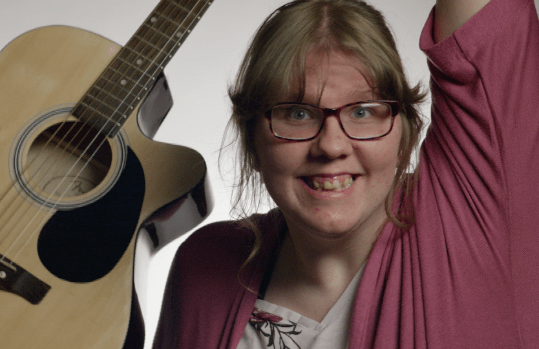 Megan with guitar