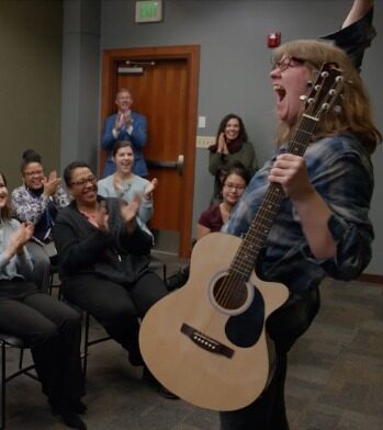 Megan playing guitar