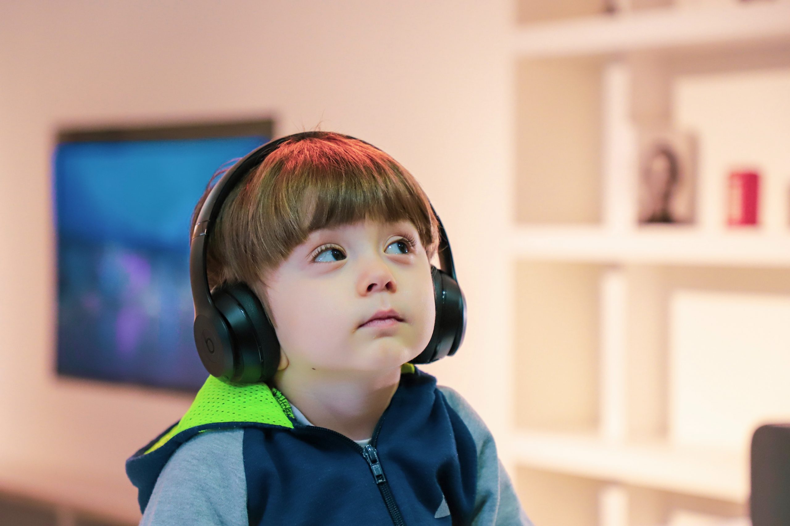 Young male child wearing headphones