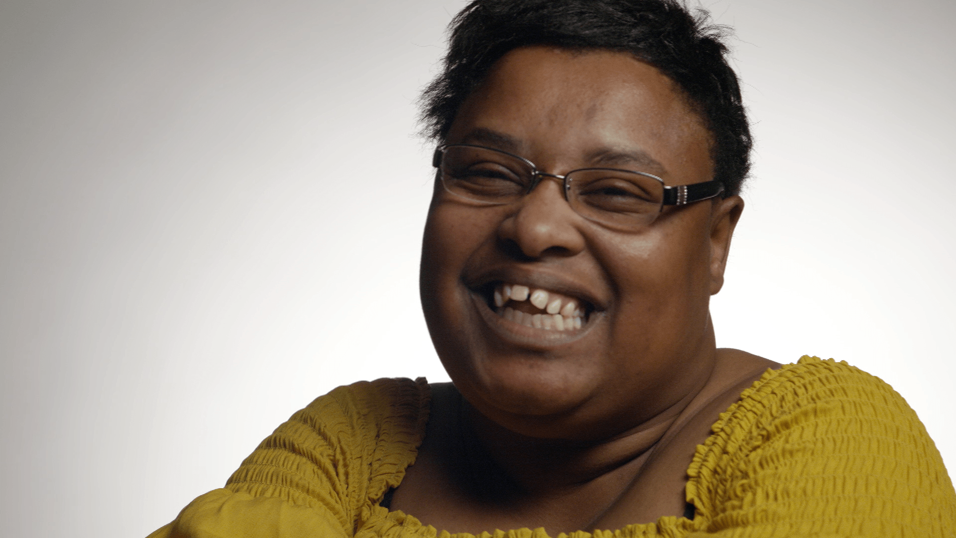 Damar client smiling