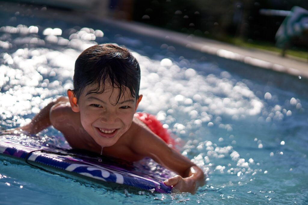 Young boy swimming