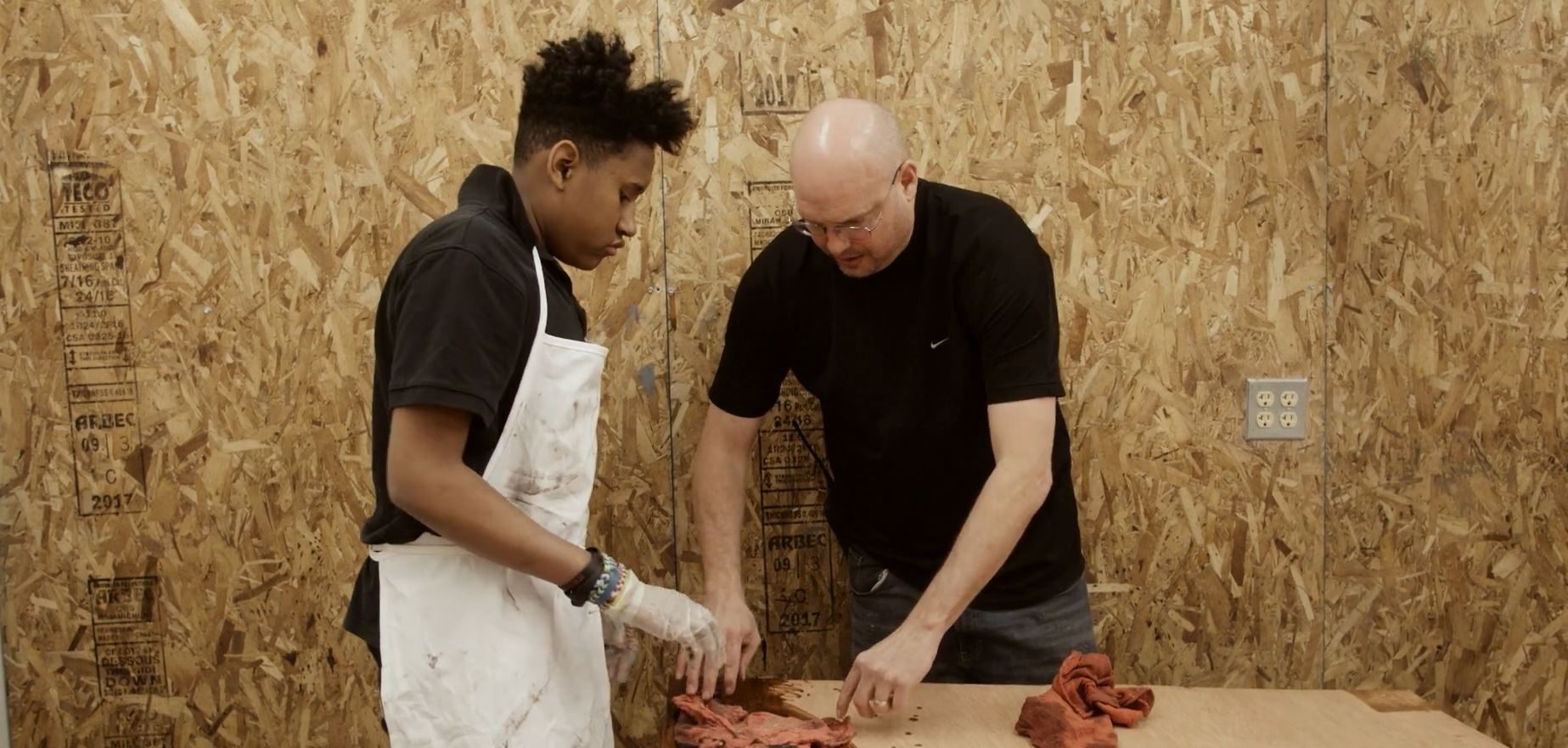 Adolescent Male working with Adult Male