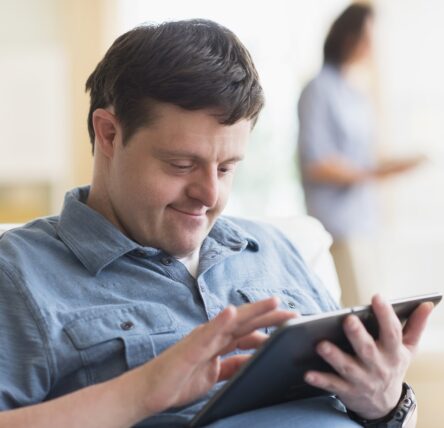 Adult male using tablet