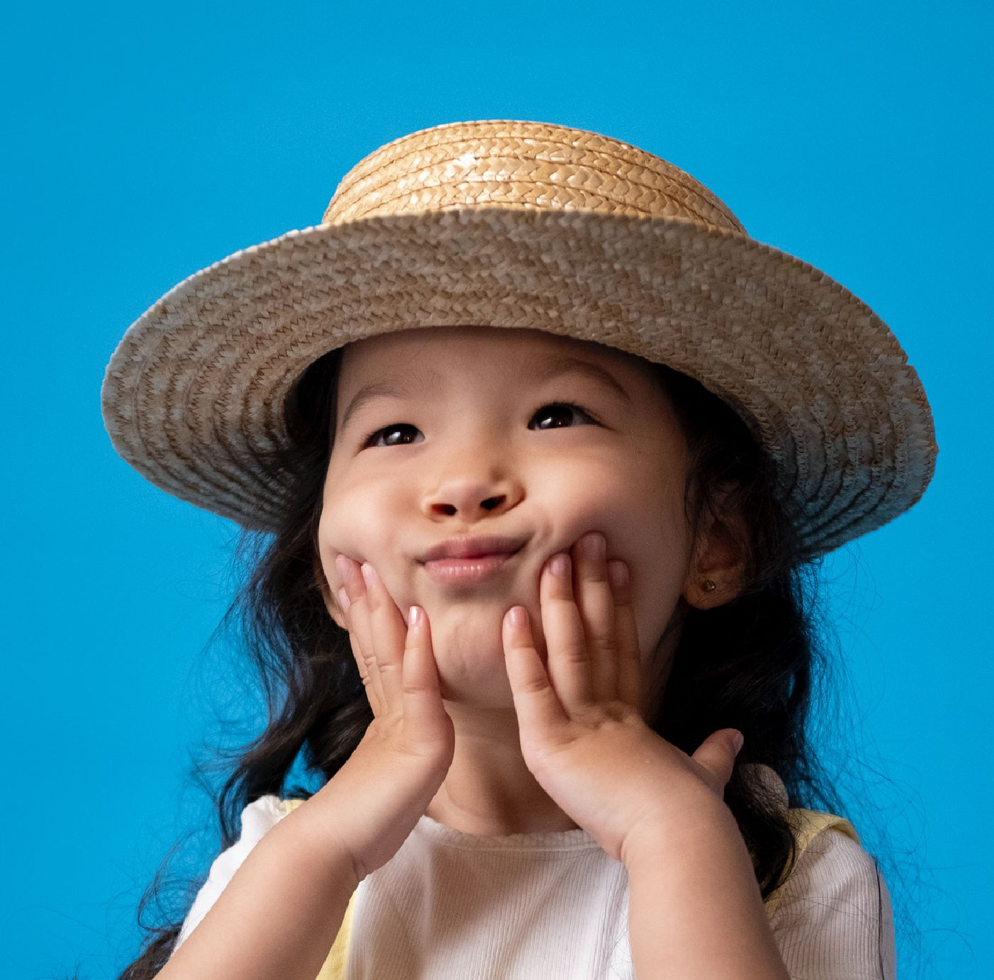 Little girl with hat on