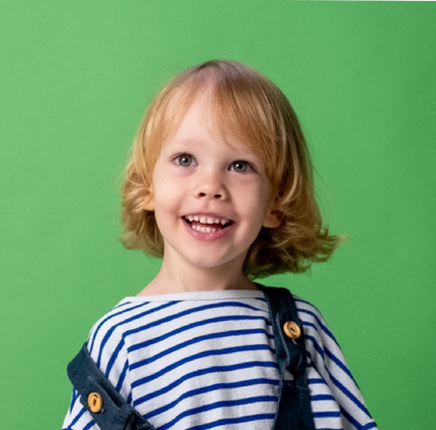 Little girl wearing overalls