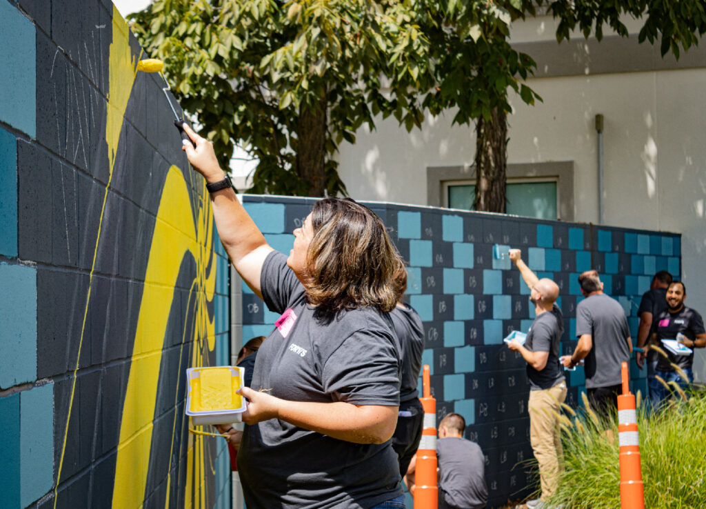 Volunteer Group painting murals