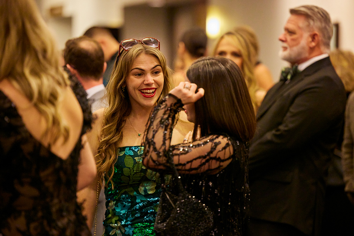 Guests connecting at a past Damar gala