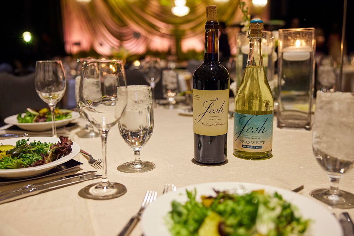 Dinner table setting at a past Damar gala